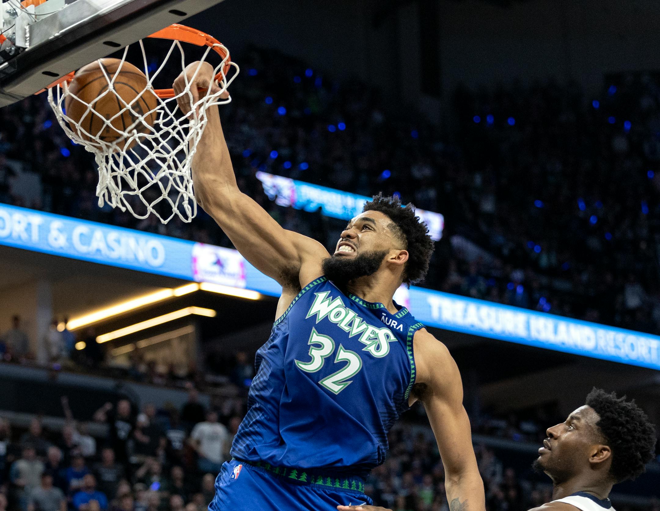 Karl Anthony-Towns (32) of the Minnesota Timberwolves dunks the ball in the fourth quarter.