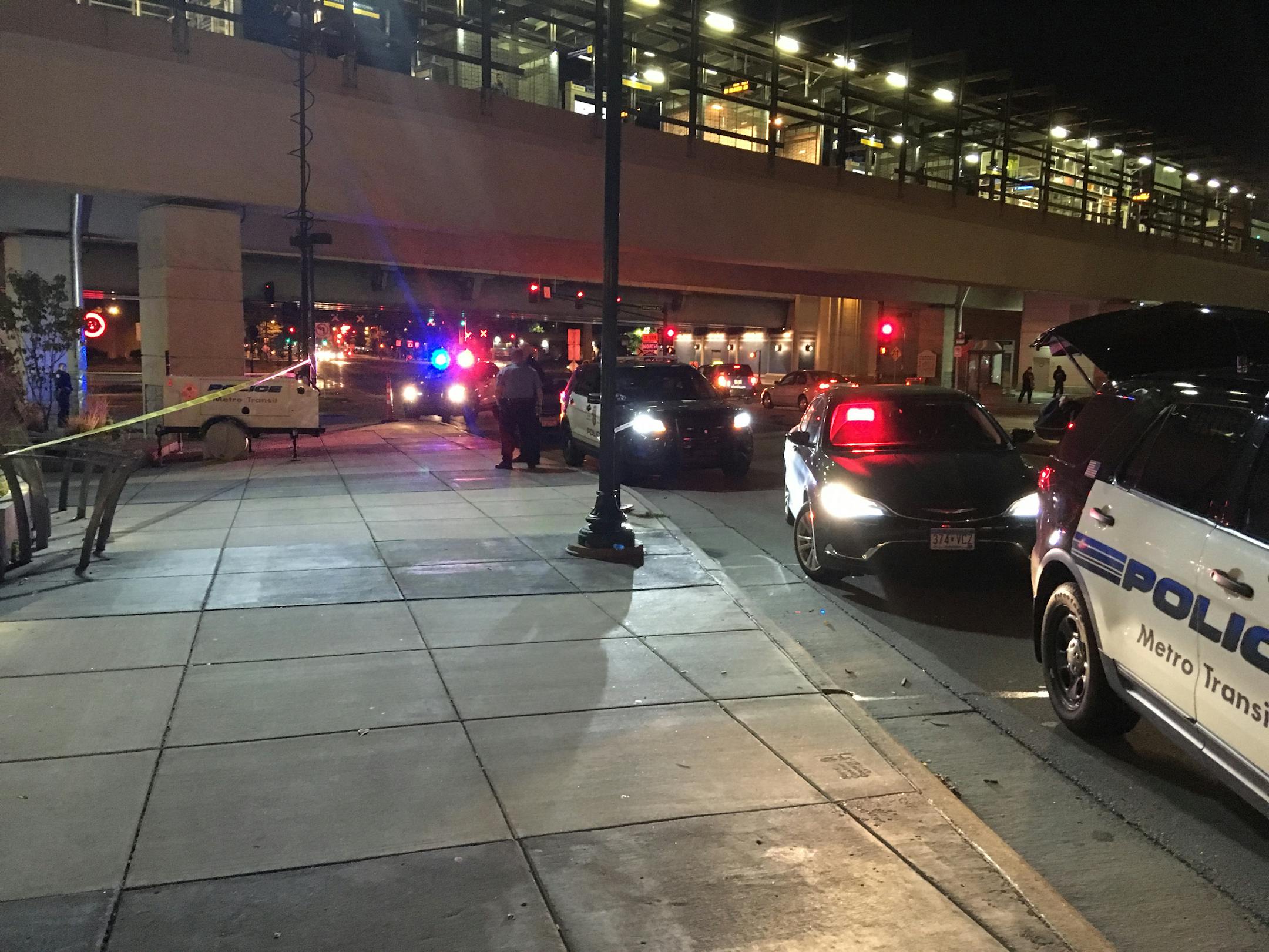 Minneapolis Police Department officers surveyed a crime scene Oct. 3 beneath the LRT station on E. Lake Street in Minneapolis.