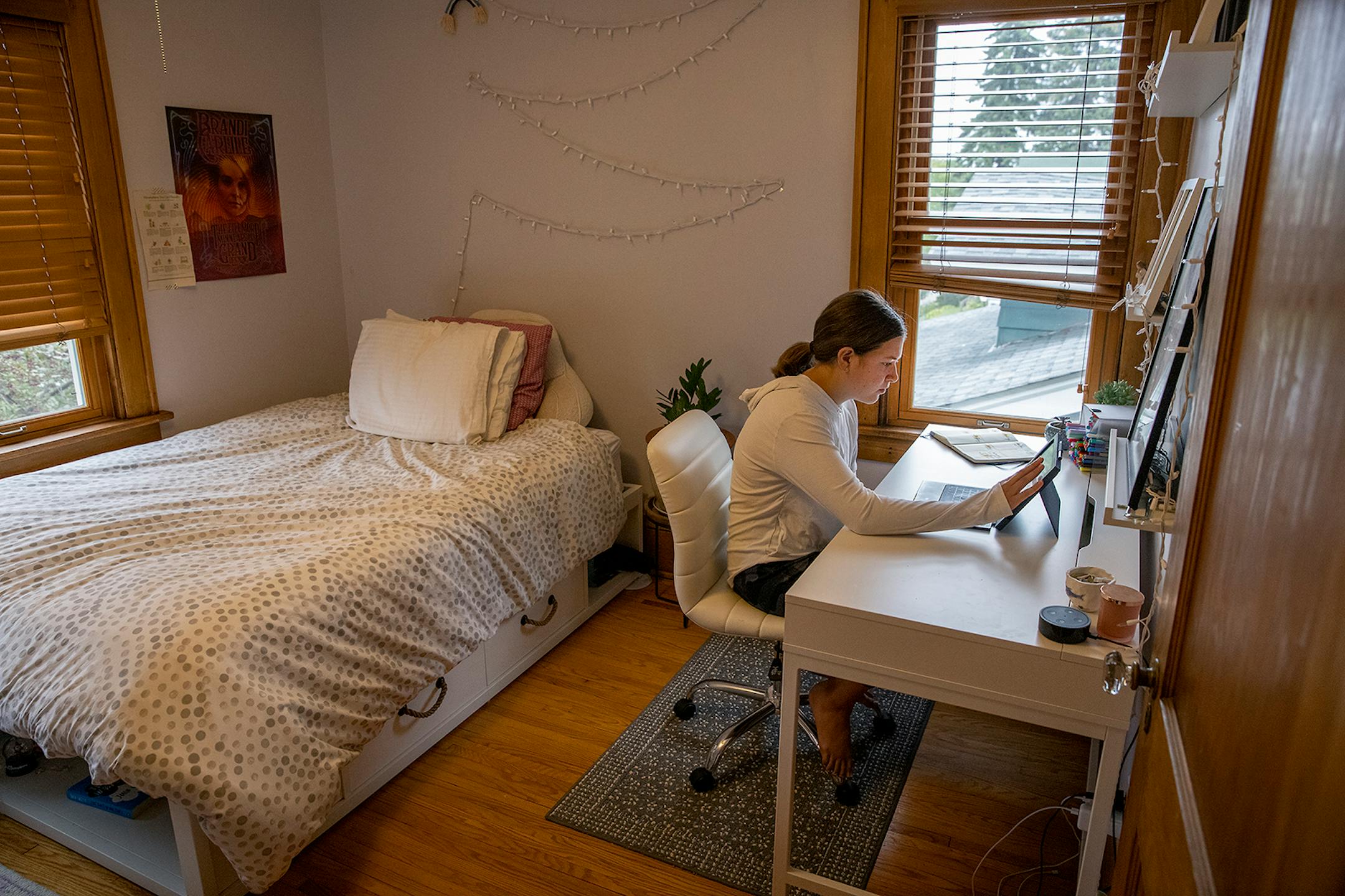 Thirteen-year-old Ellen Hendricks worked her first day of 8th-grade from her bedroom, Tuesday, September 8, 2020 in St. Paul, MN. Hendricks attends the Global Arts Plus school.