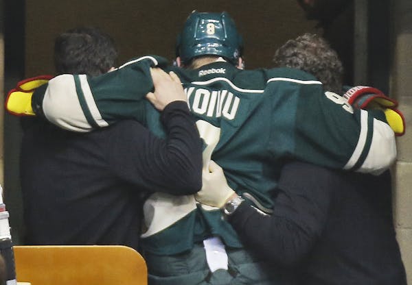 Mikko Koivu was helped off the ice and to the Wild dressing room after sustaining an injury during second-period play against Washington.
