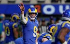Los Angeles Rams quarterback Matthew Stafford (9) yells to the sideline during the first half of an NFL football game against the San Francisco 49ers,