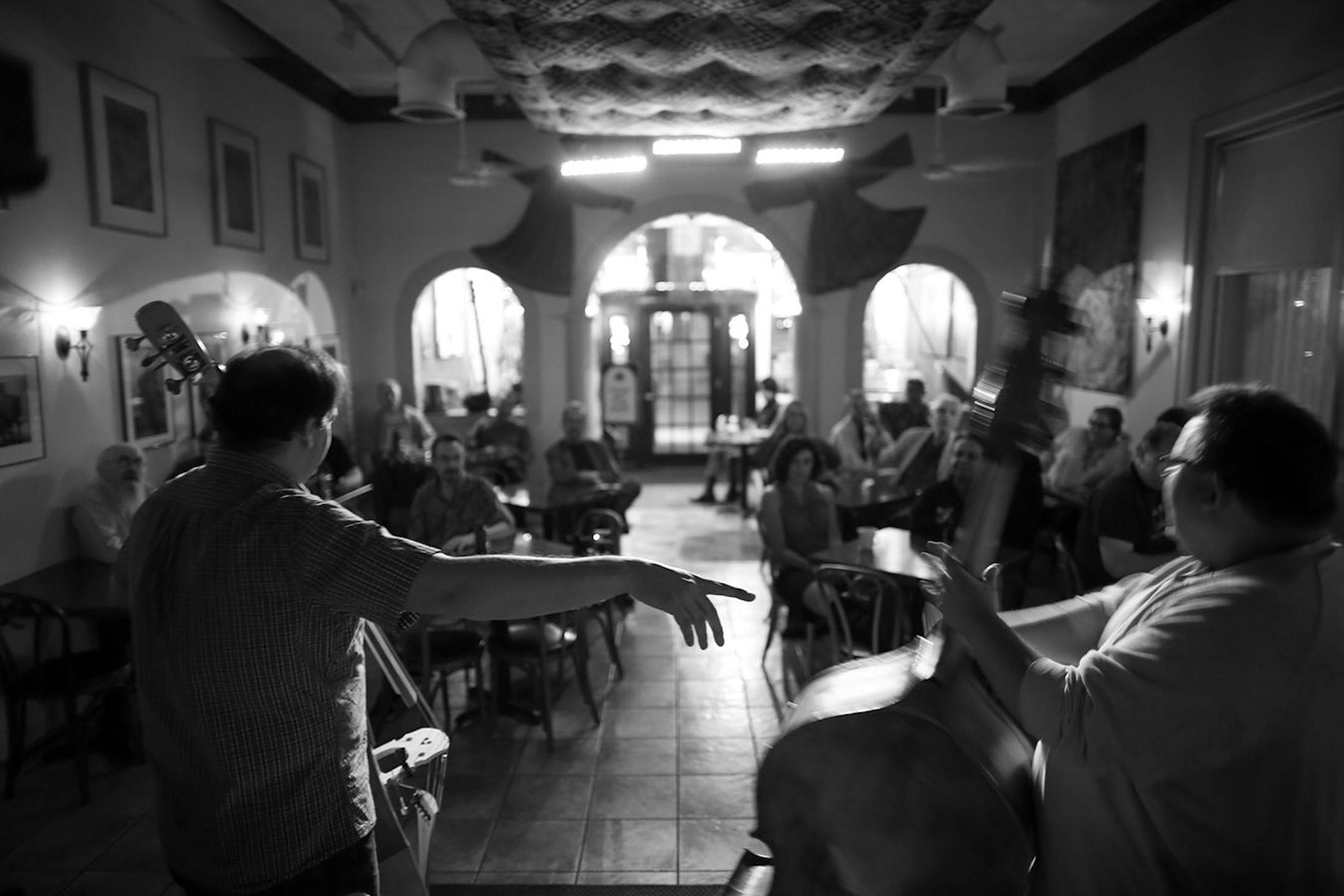 Chris Bates, left, introduced Adam Linz before they began their set of bass duets to kick off the night of jazz at Khyber Pass earlier this month.