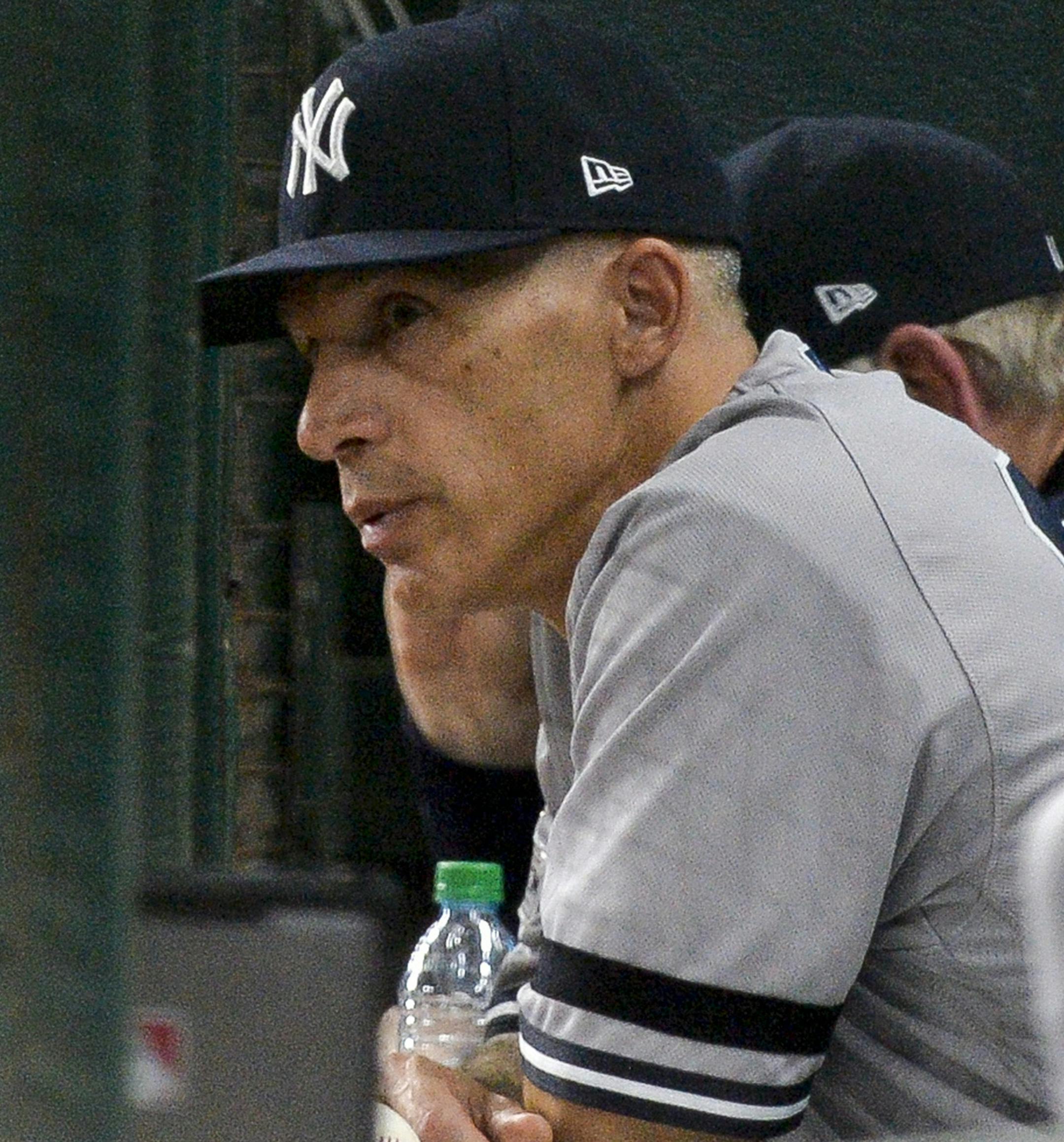 New York Yankees manager Joe Girardi in the dugout against the Houston Astros in Game 7 of the American League Championship Series at Minute Maid Park in Houston on Saturday, Oct. 21, 2017. (Howard Simmons/New York Daily News/TNS)