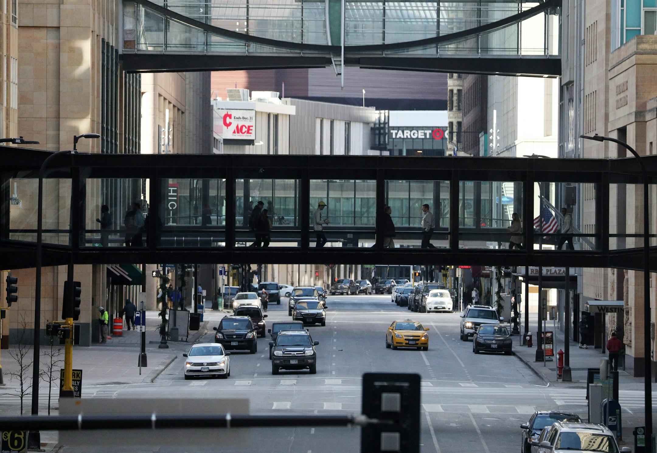 Pedestrians passed over South 6th Street in the skyways Tuesday. ] ANTHONY SOUFFLE • anthony.souffle@startribune.com Thousands of Super Bowl visitors are about to experience the signature experience of downtown Minneapolis: getting lost in the skyways. But Super Bowl planners have plans to bring the perplexed partiers safely home, including an army of volunteer guides and a specially designed phone navigation app.