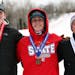 Boys alpine individual winners, from left, third place, Isaiah Nelson of West Lutheran Plymouth, first place, Elliott Boman of Northfield, and, second