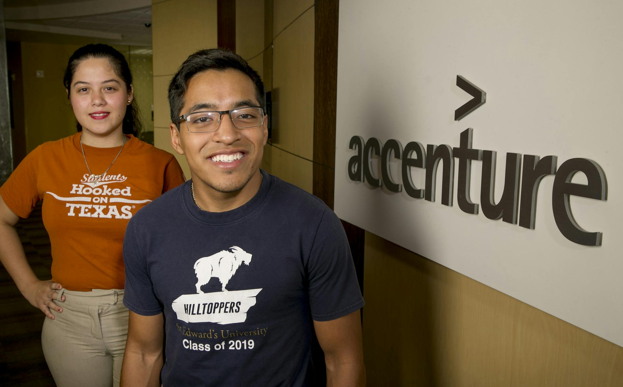 Adriana Ortiz and Joseph Ramirez at Accenture on Thursday, Aug. 17, 2017, where they were interns. (Jay Janner/Austin American-Statesman/TNS) ORG XMIT: 1212494