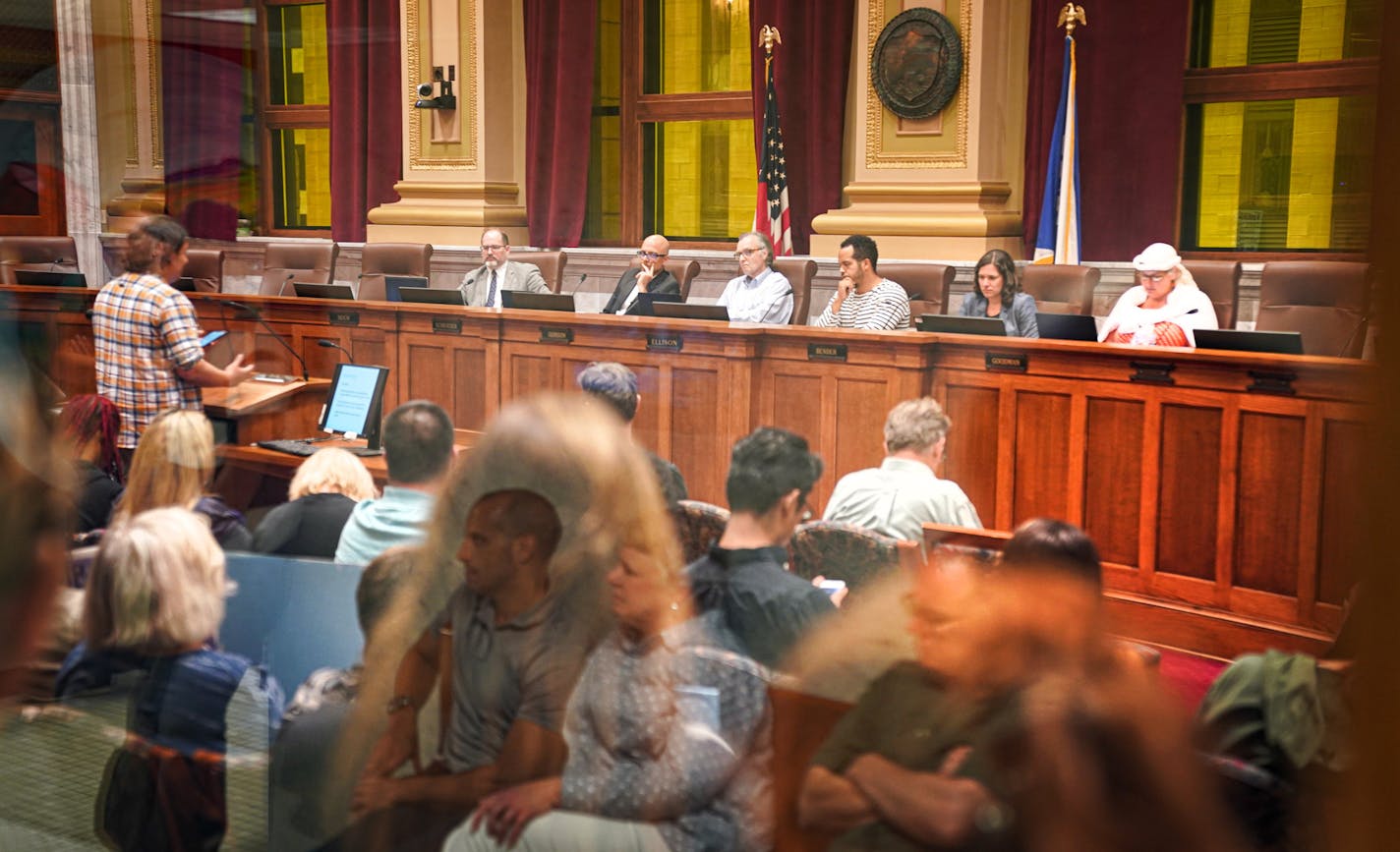 Overflow crowds watched testimony for and against the new laws in the hallway outside Minneapolis City Council Chambers as well as inside the backed room inside. ] GLEN STUBBE • glen.stubbe@startribune.com Wednesday, August 28, 2019 Renters and their advocacy groups squared off against landlords and their associations over two controversial proposed Minneapolis ordinances that would limit how tenant screenings including criminal backgrounds, eviction history and credit scores are used to determi