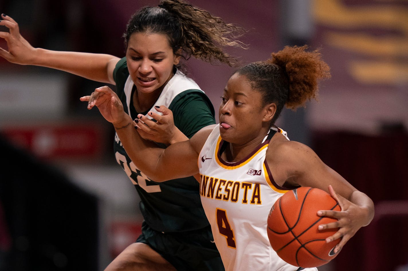 Minnesota Gophers guard Jasmine Powell (4) drove aroiund Michigan State Spartans guard Moira Joiner (22) in the third quarter. ] JEFF WHEELER • jeff.wheeler@startribune.com