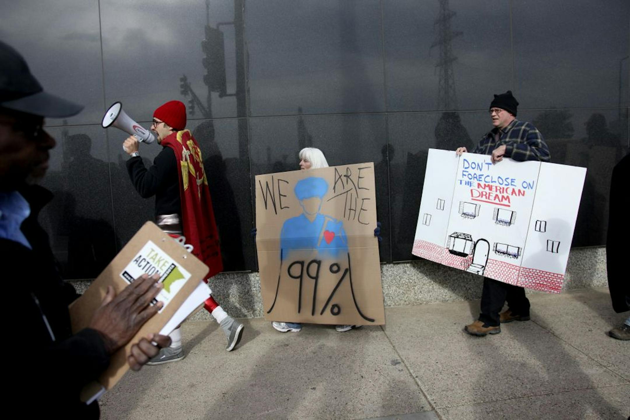 Minnesotans from faith, labor and community groups rallied Tuesday outside the Minnesota Chamber of Commerce's annual meeting in downtown St. Paul.