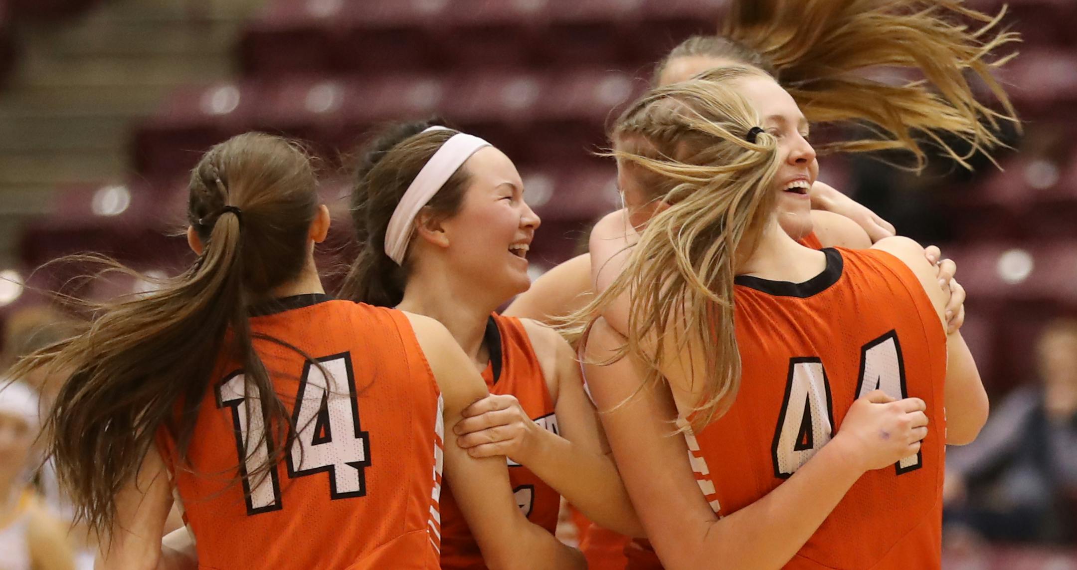Winona celebrates its victory over DeLaSalle.] Winona meets DeLaSalle in the quarterfinals at Mariucci Arena. Richard Tsong-Taatarii/ richard.tsong-taatarii@startribune.com