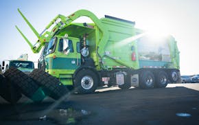 A brand new truck rolls into the garage at Walters Recycling and Refuse in Blaine, Minn., on Wednesday, Jan. 31, 2024. A judge will hear a lawsuit