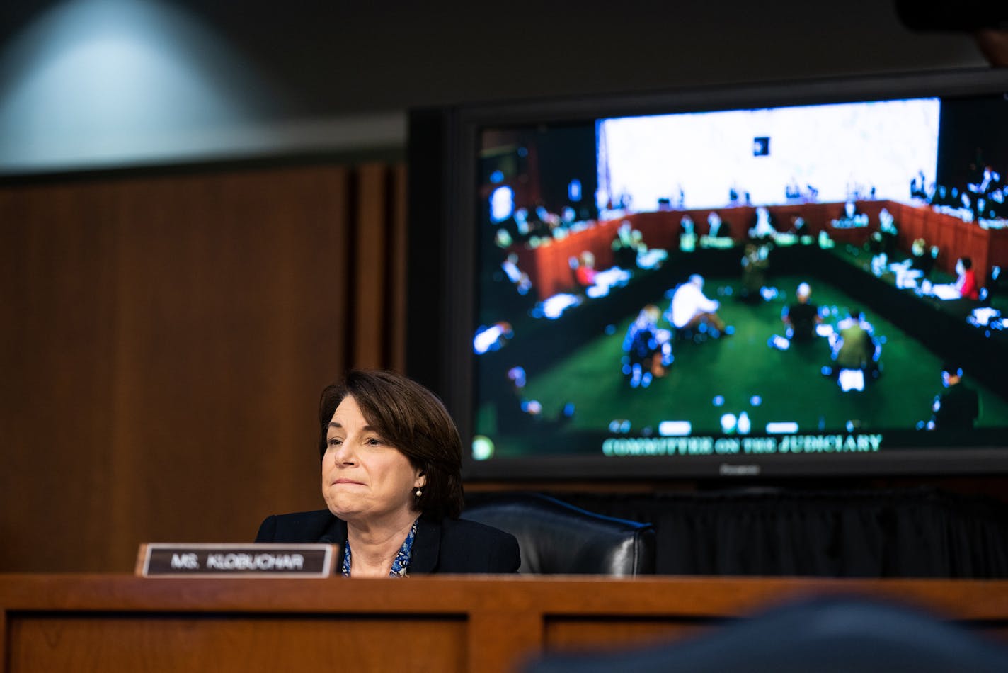 Sen. Amy Klobuchar (D-Minn.) attends a Senate Judiciary Committee business meeting in Washington, Oct. 15, 2020, on the fourth day of the confirmation hearing for Judge Amy Coney Barrett, President Donald Trump's Nominee for Supreme Court. Democrats are moving to shut down the Senate Judiciary Committee hearing on Judge Amy Coney Barrett's nomination in protest of Republicans' decision to schedule an Oct. 22 vote on it over their objections.