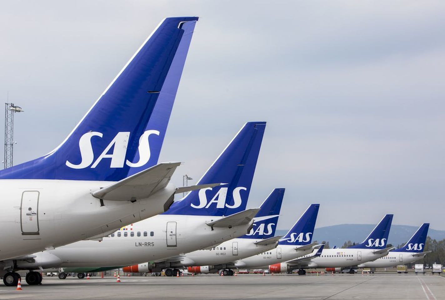 SAS planes are seen lined up at Oslo Gardermoen airport in Oslo.