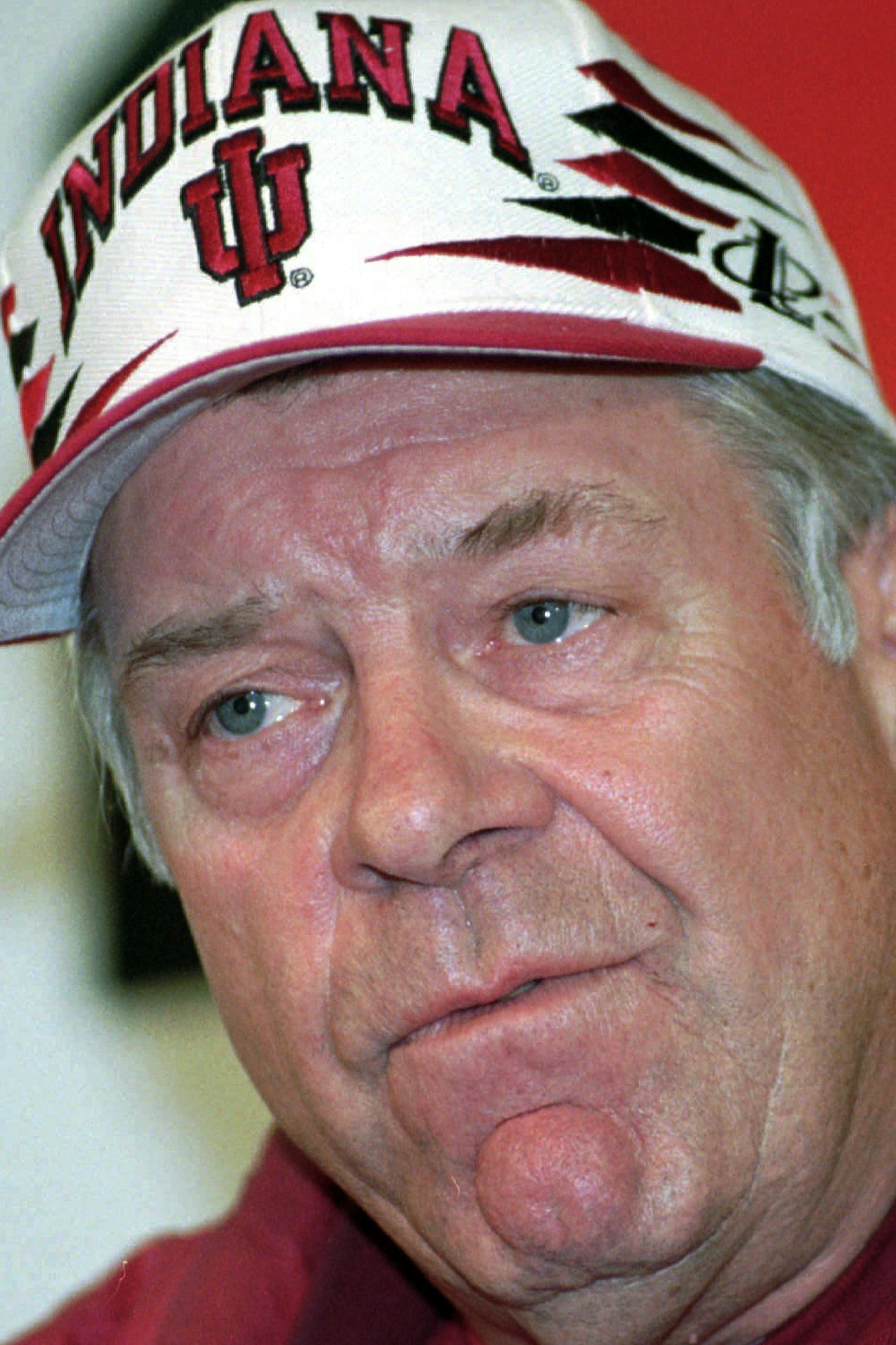FILE - In this Oct. 31, 1996, file photo, Indiana University football coach Bill Mallory speaks at a news conference in Bloomington, Ind., after he was fired. Mallory, the winningest football coach in Indiana history who also led three other schools to bowl games, has died from a brain injury suffered in a recent fall. He was 83. (AP Photo/Chuck Robinson, File)