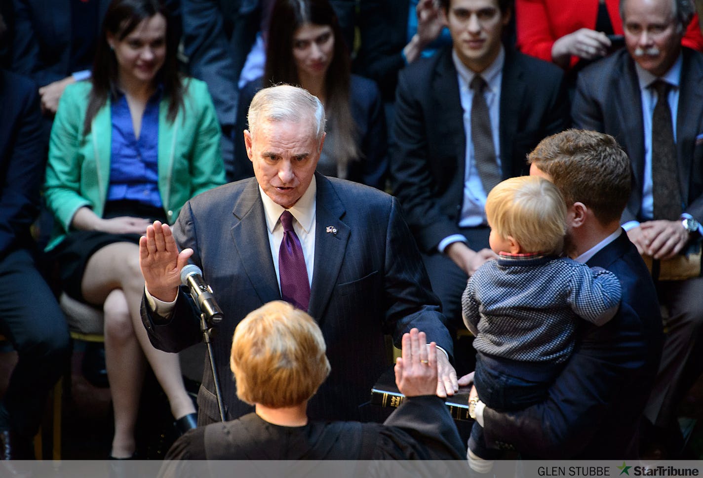 Governor Mark Dayton is sworn in.       ]   GLEN STUBBE * gstubbe@startribune.com   Monday January 5,  2015   Next Monday, January 5, Governor Mark Dayton and Lt. Governor-Elect Tina Smith will take the oath of office at an official inauguration ceremony beginning at 12:00pm at the Landmark Center in St. Paul.  138026