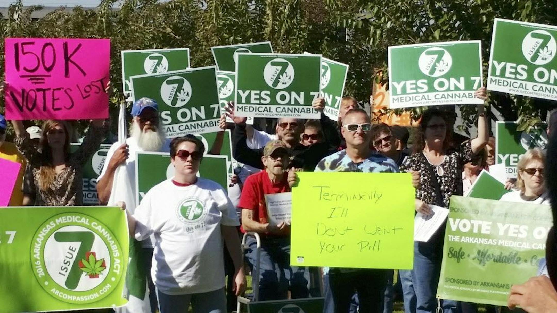 FILE - In this Oct. 28, 2016 file photo, supporters of Arkansas Issue 7, a medical marijuana initiative that would have allowed patients with certain conditions an opportunity to obtain or grow marijuana to ease their symptoms, rally outside the Arkansas Supreme Court building in Little Rock. Arkansas could become the first state in the South to legalize medical marijuana, as pot advocates look to the state in the Tuesday, Nov. 8 election to prove that support for the drug is strong even in deep