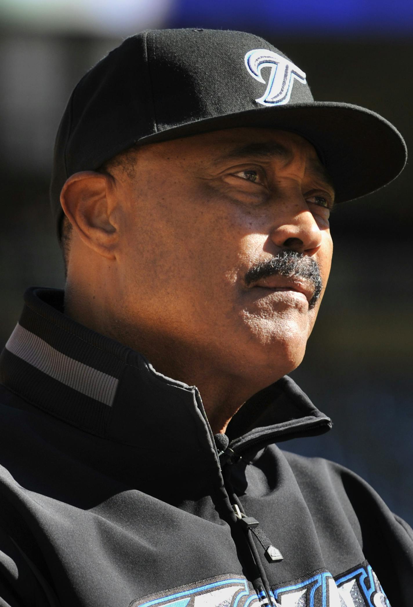 Toronto Blue Jays manager Cito Gaston waits to do his final pregame interview before a baseball game against the Minnesota Twins, Sunday, Oct. 3, 2010, in Minneapolis as the regular season ends for both teams. (AP Photo/Jim Mone) ORG XMIT: MNJM104