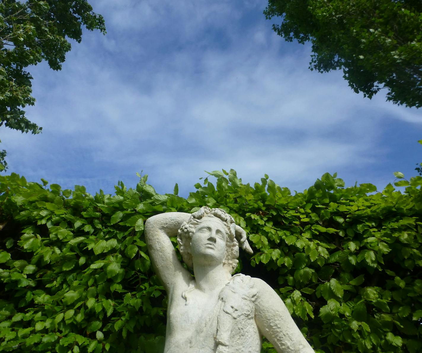 A statue of Bacchus is on display at the Sissinghurst Garden and Manor in Kent, England.