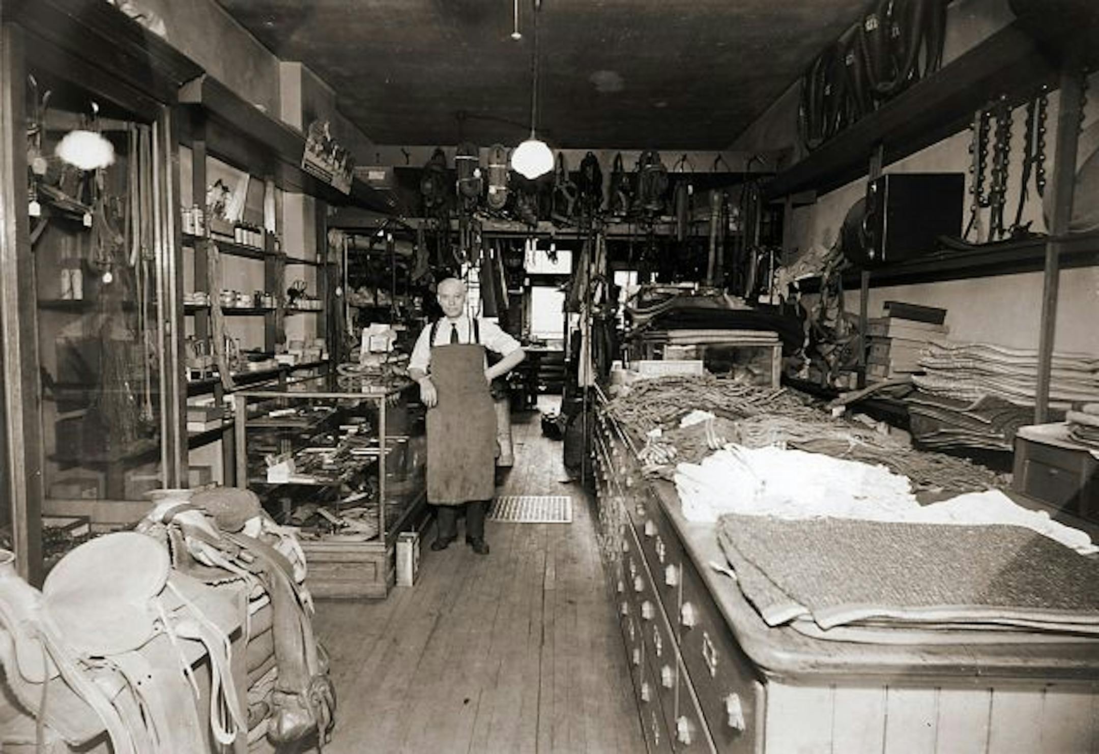 Emil Schatzlein opened the Schatzlein Saddle Shop on Lake Street in 1907. He's shown in the store circa 1938.