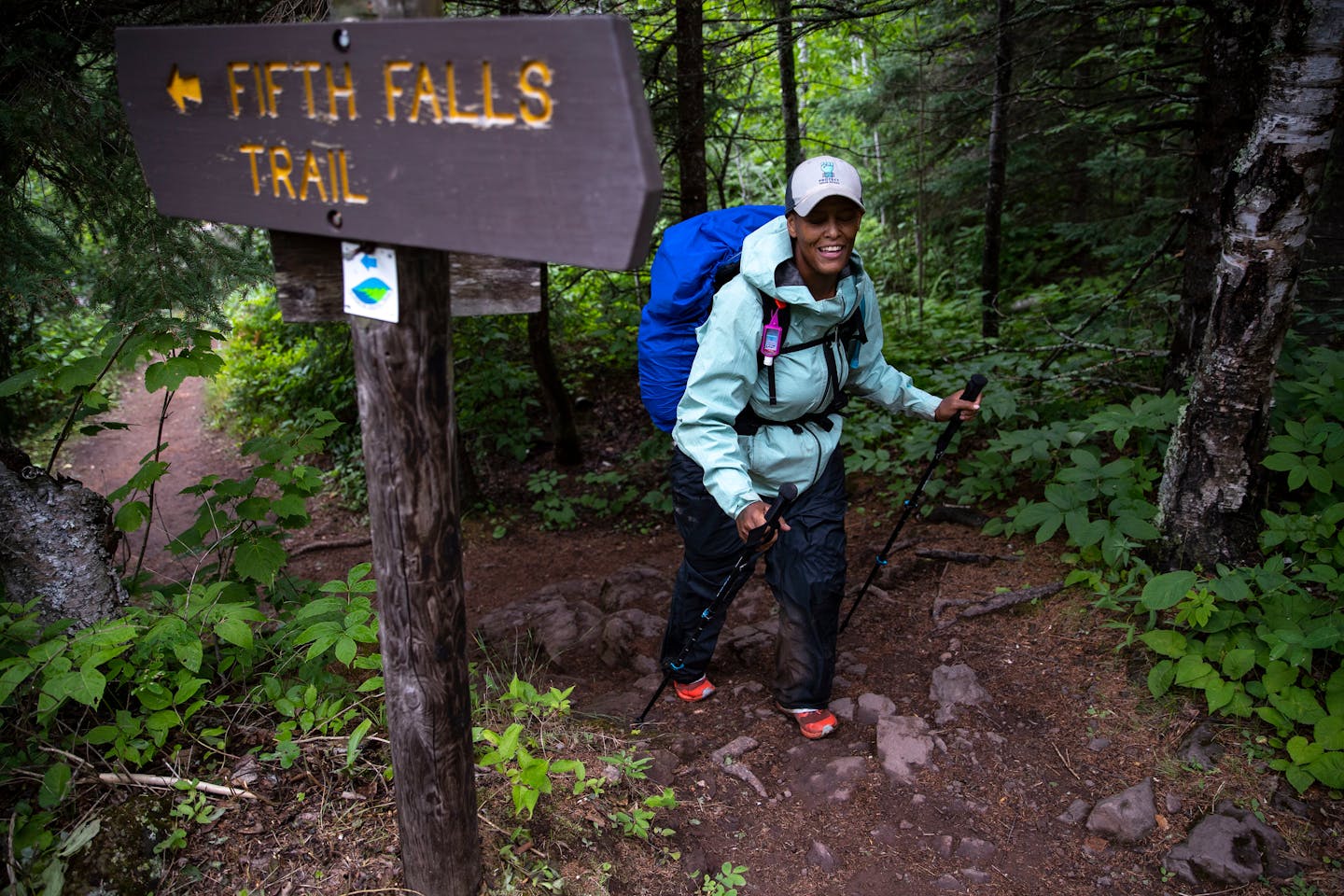 Shown Tuesday near Gooseberry Falls, Crystal Gail Welcome made her way on a wet day. "This is one way I can stand up for justice," she said of her thru-hike attempt Up North.