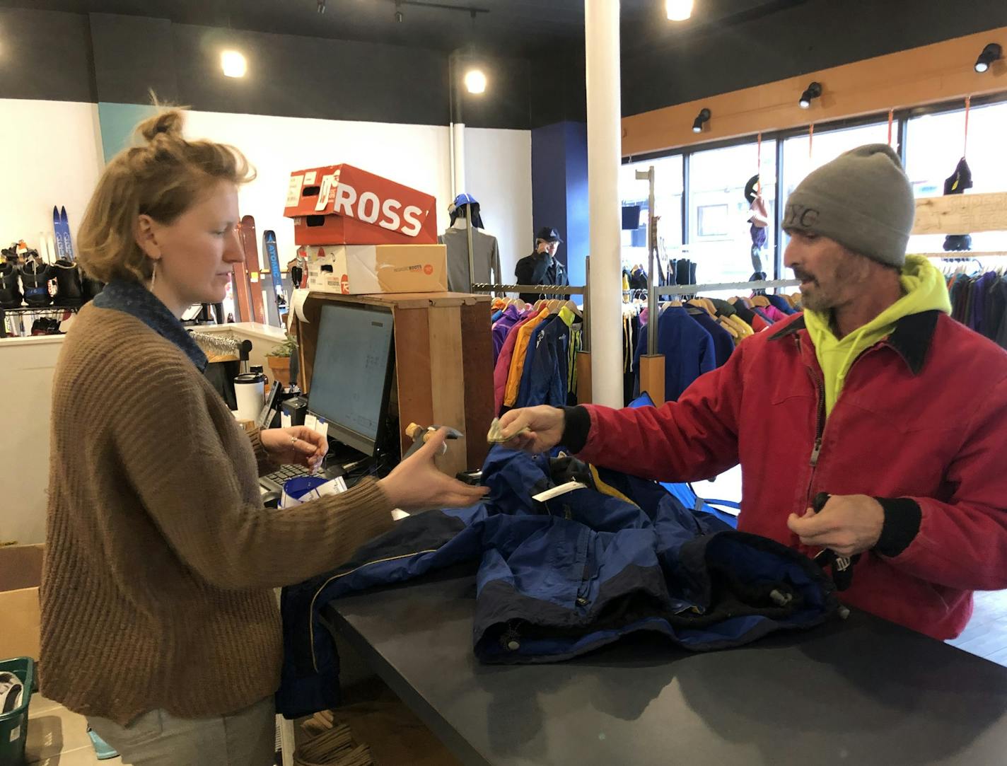 Great Lakes Gear Exchange co-owner Brooke Wetmore rang up a ski jacket for Joe Schiavone. "I couldn't pass it up. It's a great deal," he said.