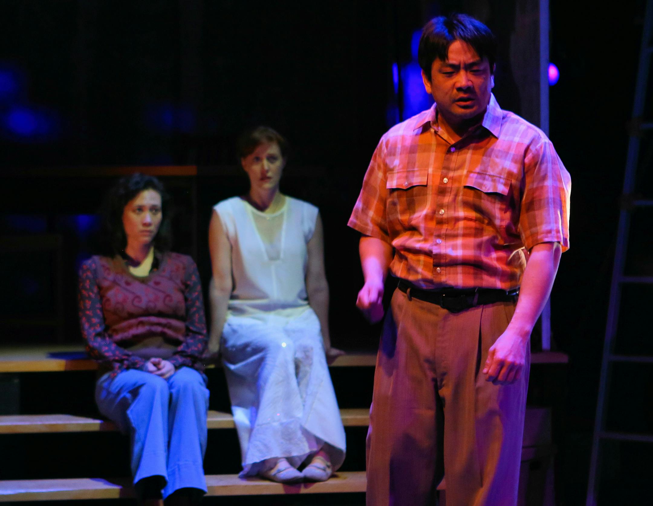 "The Paper Dreams of Harry Chin" - MN History Theatre
(l-r) Meghan Kriedler, Sandra Struthers and Song Kim (foreground) as Harry Chin. Photo credit: Scott Pakudaitis