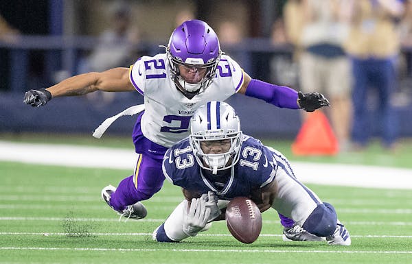 Vikings cornerback Mike Hughes stopped a pass intended for Dallas wide receiver Michael Gallup
