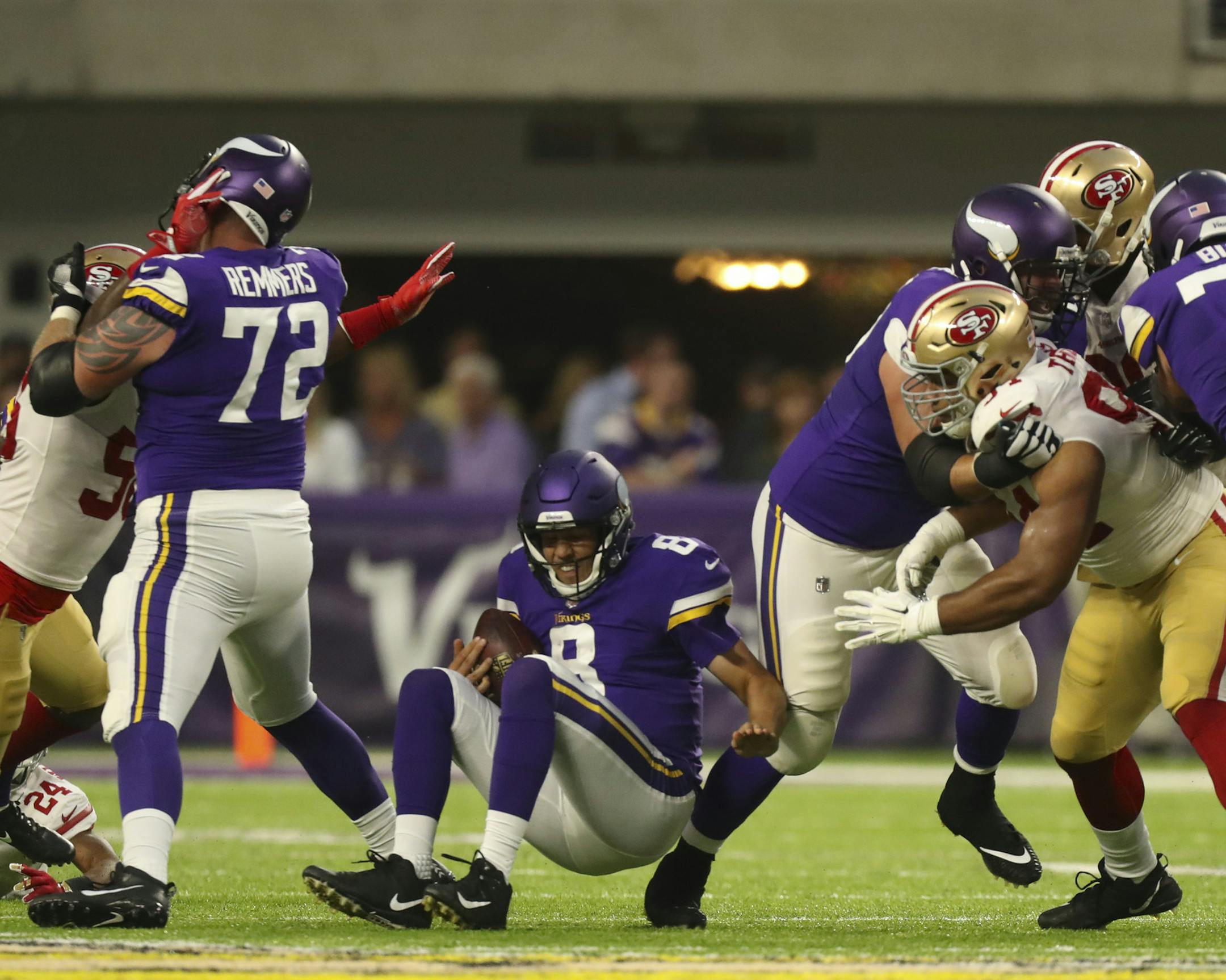 Minnesota Vikings quarterback Sam Bradford (8) was sacked for an eight yard loss by San Francisco 49ers defensive end Elvis Dumervil (58) in the first quarter. ] JEFF WHEELER &#xef; jeff.wheeler@startribune.com The Minnesota Vikings met the San Francisco 49ers in their third game of the NFL preseason Sunday night, August 27, 2017 at U.S. Bank Stadium in Minneapolis.