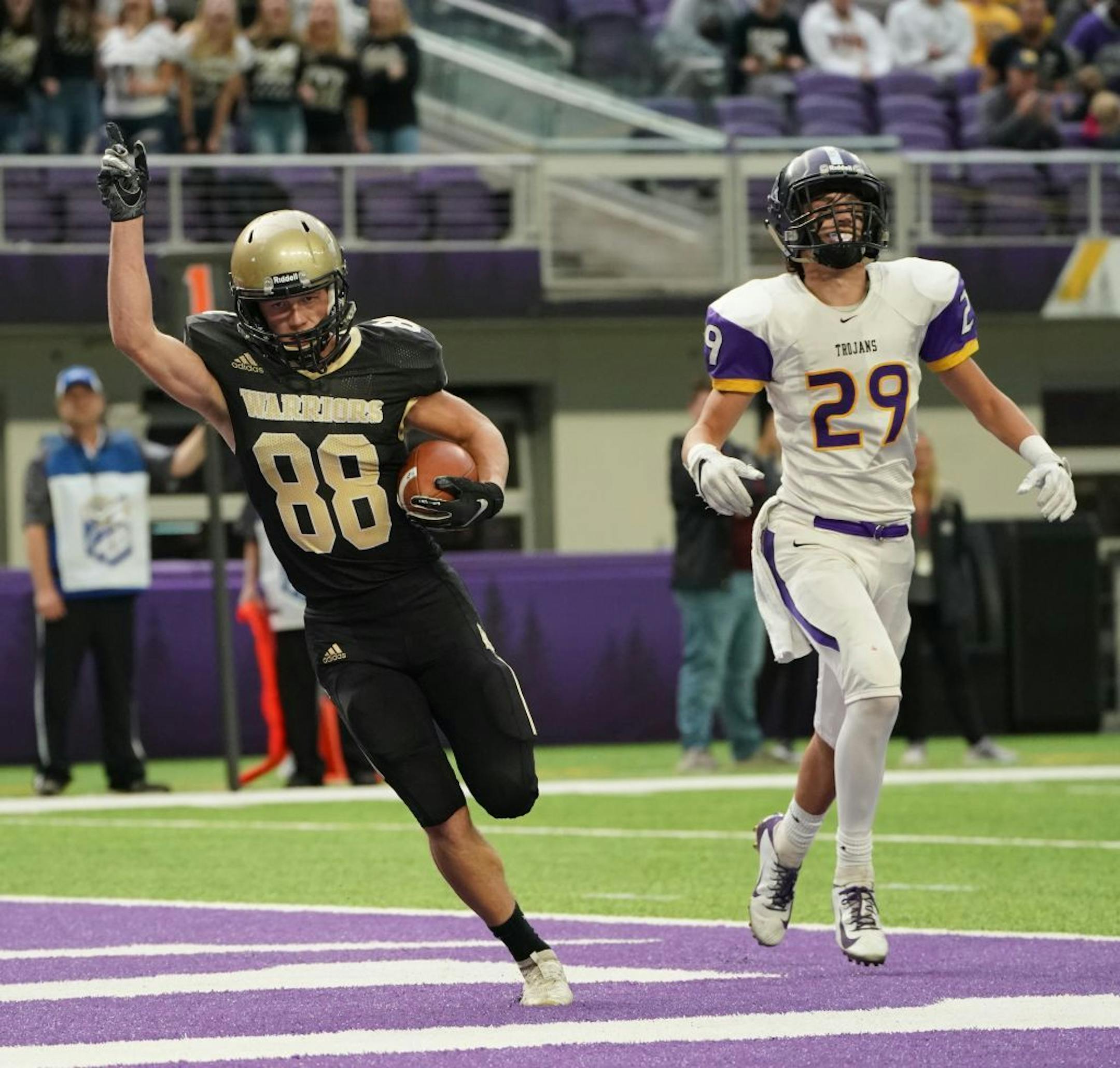 Caledonia wide receiver Cole Kronebusch (88) celebrated a touchdown before it was called back because of a holding call in the first half. Defending was Barnesville's Cameron Heng (29).