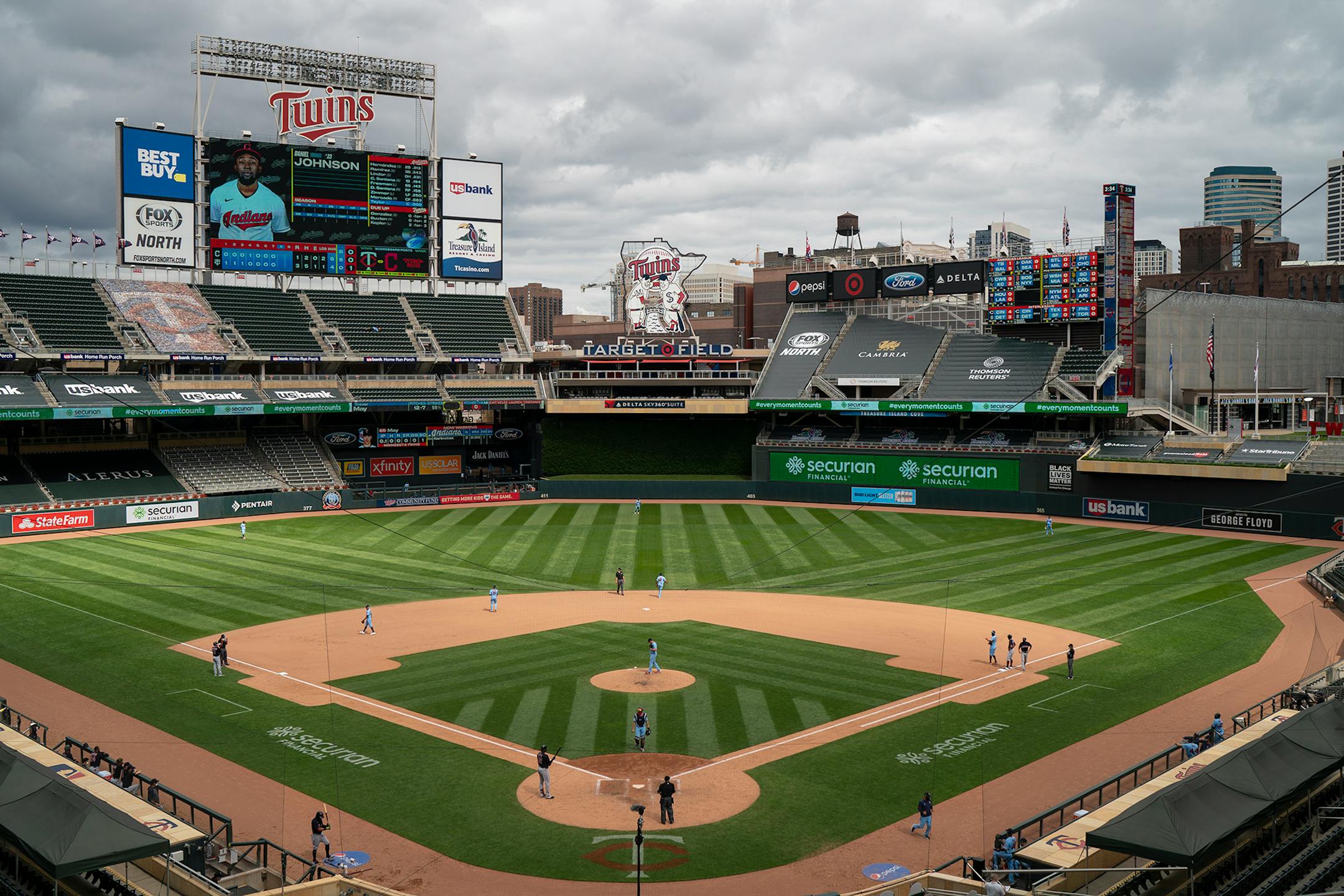 Minnesota Twins manager Rocco Baldelli returned to the dugout after visiting with pitcher Trevor May on the mound in the eighth inning.