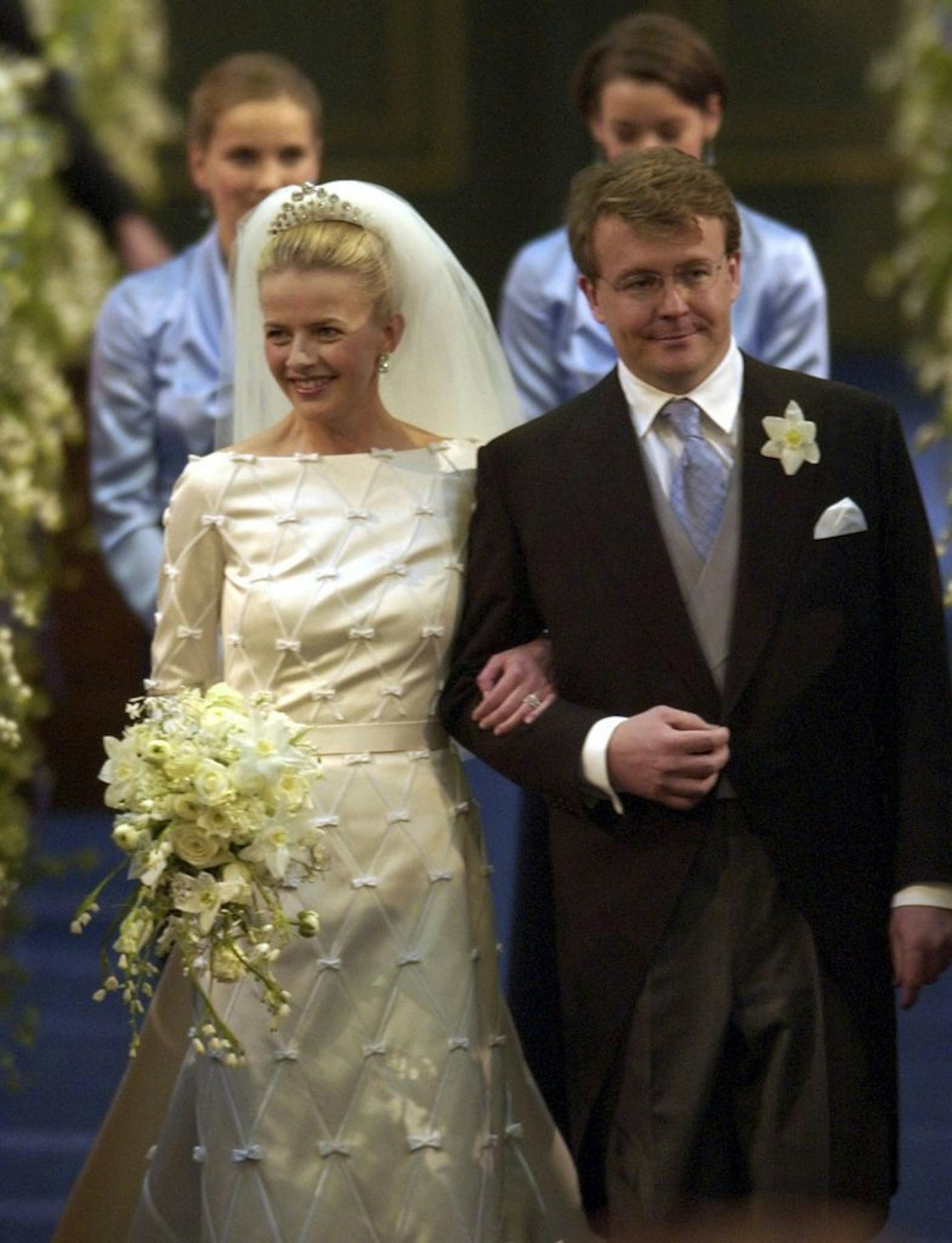 FILE - In this April 24, 2004 file photo Dutch Prince Johan Friso, second son of Queen Beatrix, right, and Mabel Wisse Smit enter the church before exchanging wedding vows at the Oude Kerk, or Old Church, in Delft, Netherlands. The Dutch royal house says in a statement on Monday, Aug. 12, 2013 that Prince Johan Friso, the youngest brother of King Willem-Alexander, has died of complications after the 2012 skiing accident that left him with grave brain damage. In a statement, the royal house said