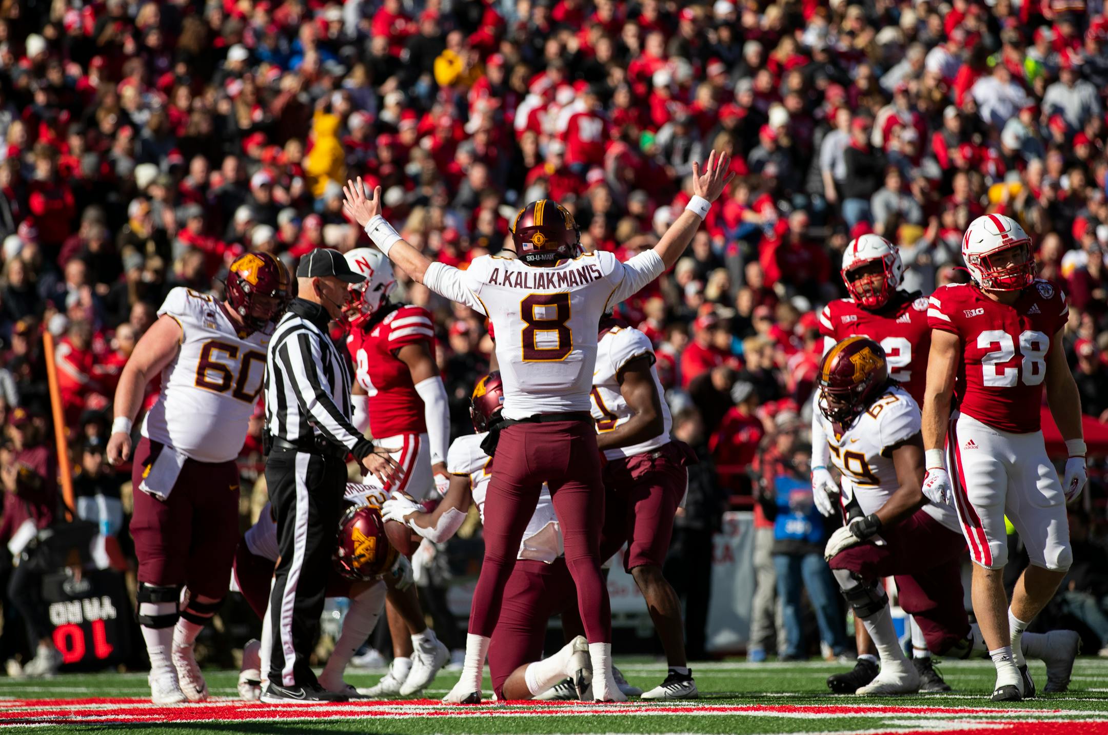 Minnesota quarterback Athan Kaliakmanis (8) celebrates a touchdown against Nebraska during the second half of an NCAA college football game Saturday, Nov. 5, 2022, in Lincoln, Neb. Minnesota defeated Nebraska 20-13. (AP Photo/Rebecca S. Gratz)
