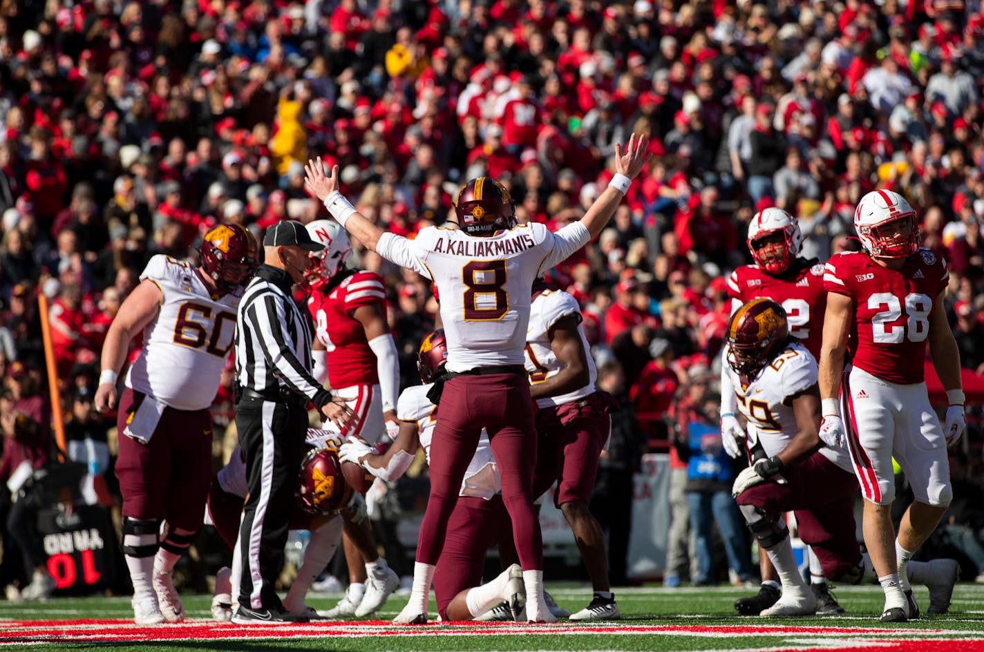 Minnesota quarterback Athan Kaliakmanis (8) celebrates a touchdown against Nebraska during the second half of an NCAA college football game Saturday, Nov. 5, 2022, in Lincoln, Neb. Minnesota defeated Nebraska 20-13. (AP Photo/Rebecca S. Gratz)