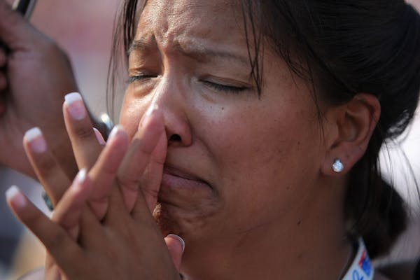 DENVER - AUGUST 28: Kristine Reeves of Washington State cries during a speech by Martin Luther King, III on day four of the Democratic National Conven