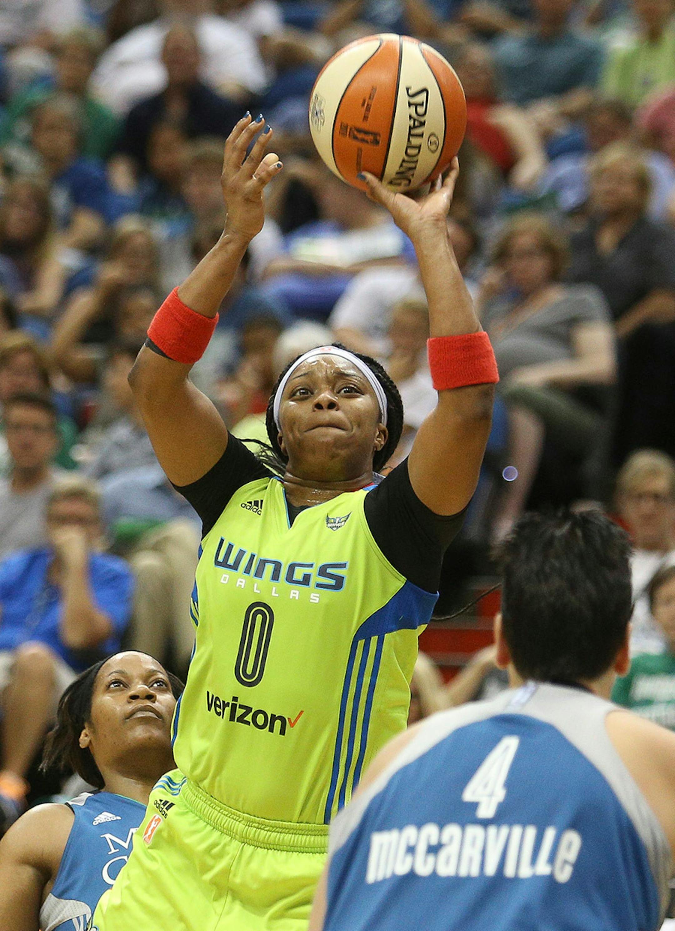 Dallas Wings guard Odyssey Sims attempt a jump shot during the third quarter.