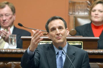 Gov. Tim Pawlenty saluted National Guard Sgt. Chad Malmberg, a Silver Star recipient, during his State of the State address Thursday in the state Hous