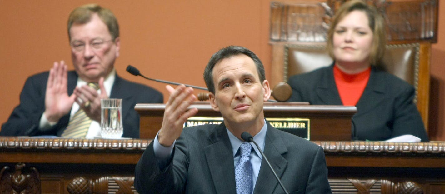 Gov. Tim Pawlenty saluted National Guard Sgt. Chad Malmberg, a Silver Star recipient, during his State of the State address Thursday in the state House Chambers. Political observers say he softened his approach because the DFL controls the Legislature.