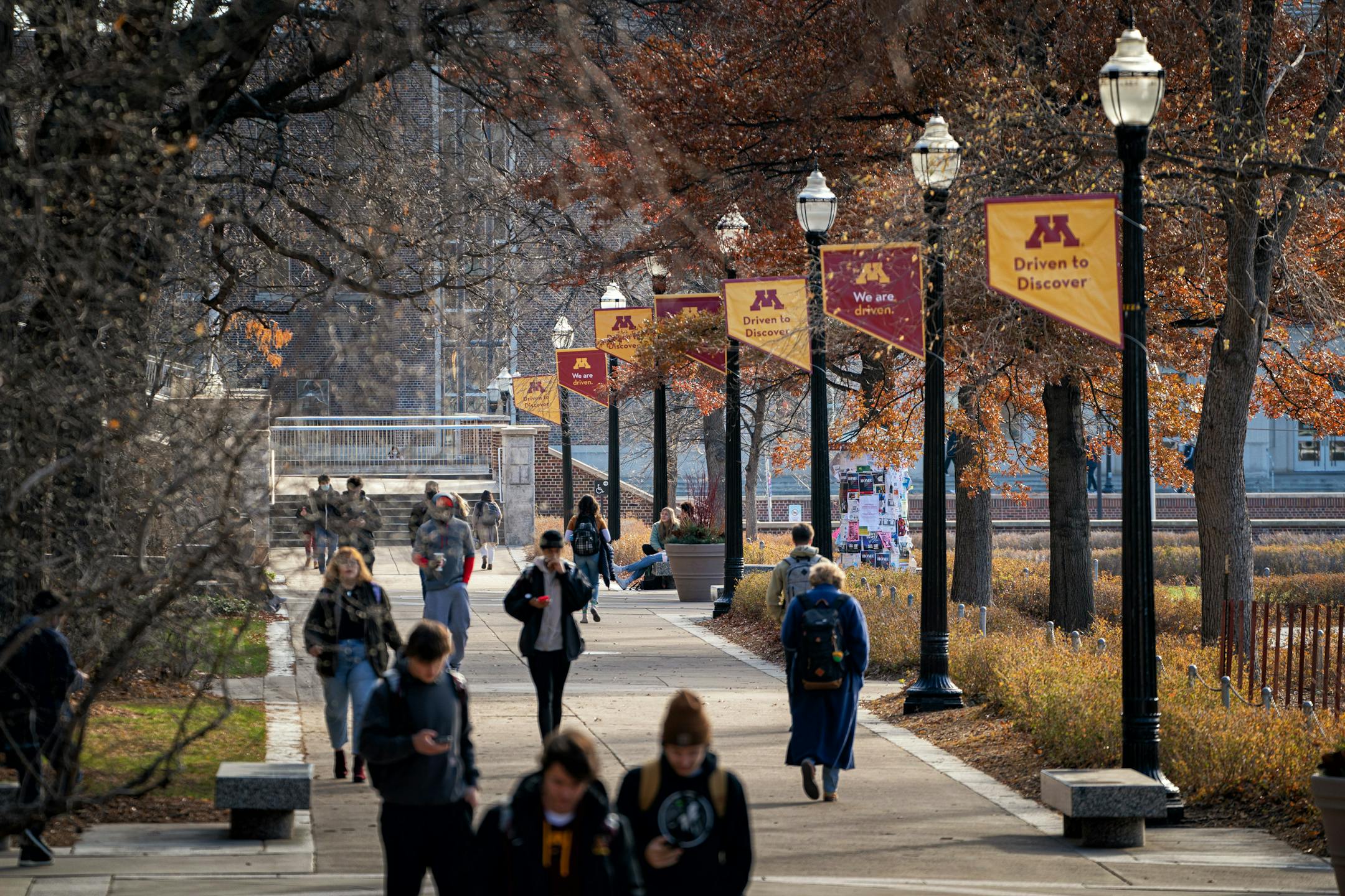 Students at the University of Minnesota, Monday, Nov. 29, 2021 in Minneapolis, Minn. More than 1,200 students attending the University of Minnesota's five campuses are taking classes for free this fall under a new tuition-free program for low-income families, one of the latest initiatives to cover the rising cost of college.
