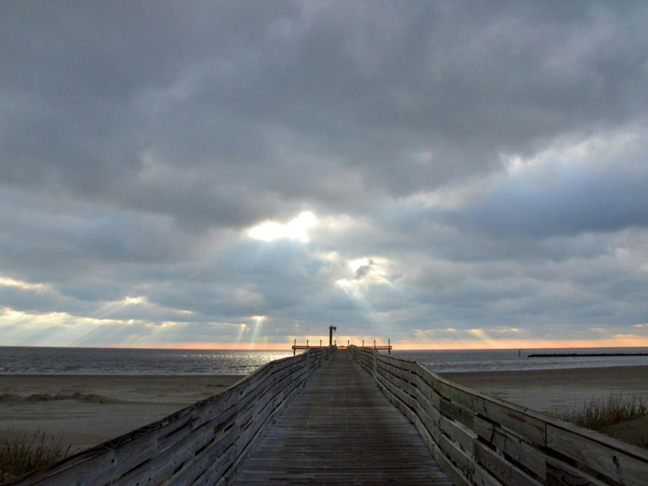 The photographer: Darcy Sime of Alden, Minn. The scene: Sime awoke to the sun breaking through the clouds at Grand Isle State Park in Louisiana after a night of camping in February. She noted in an e-mail that Grand Isle "Has seen its share of hurricanes, including Katrina, which destroyed the original fishing pier. "She added that it "was also at the center of the BP oil spill, but now it has been rebuilt and cleaned up and Grand Isle is once again the fishing and birding paradise that it used