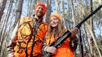 Zeb McInerny with his 13-year-old daughter, Ella, on Friday afternoon outside their home in rural Rockford. The family won a hunting license lottery f