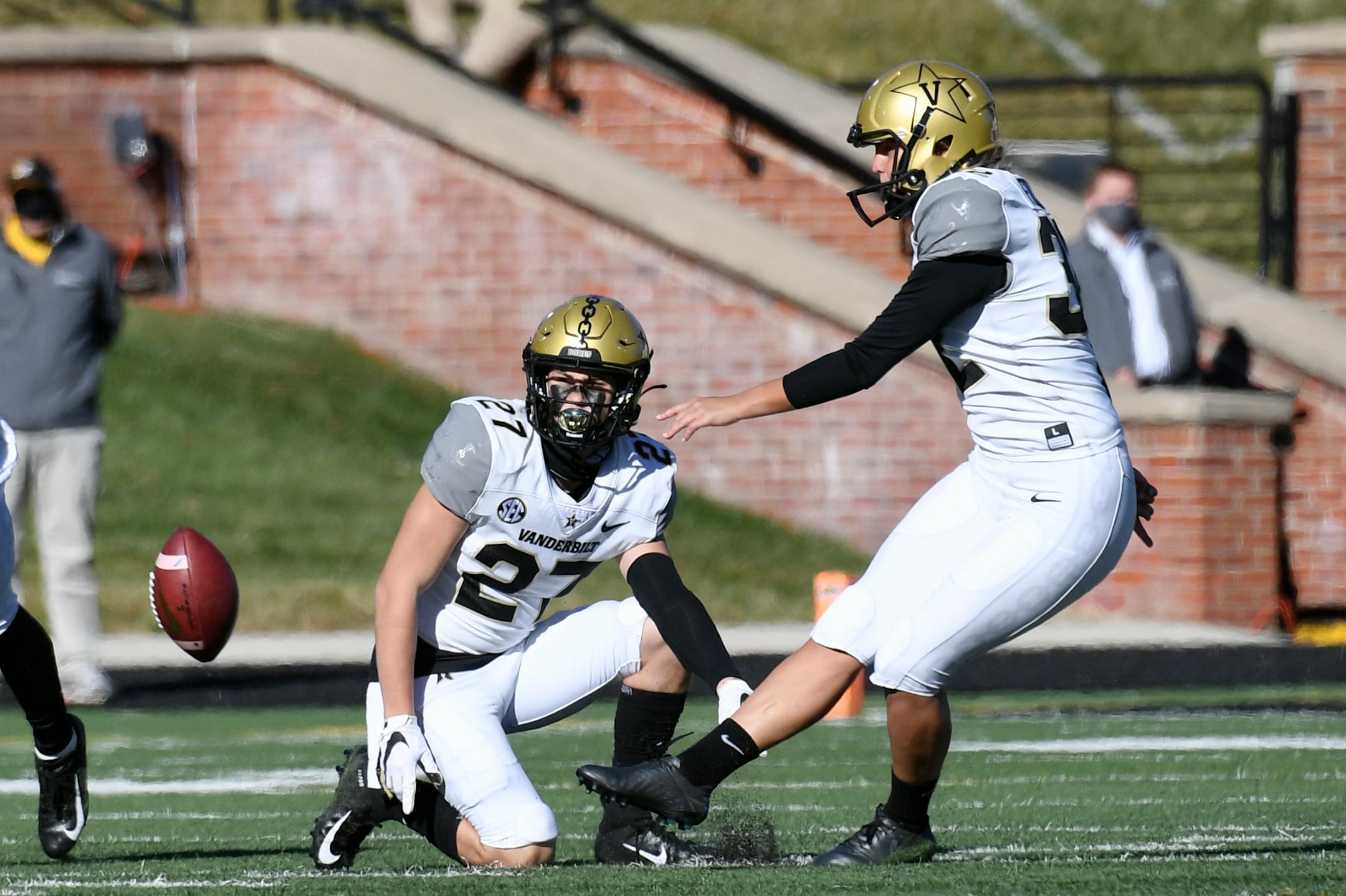 Vanderbilt's Sarah Fuller kicks off as Ryan McCord holds to start the second half against Missouri on Saturday