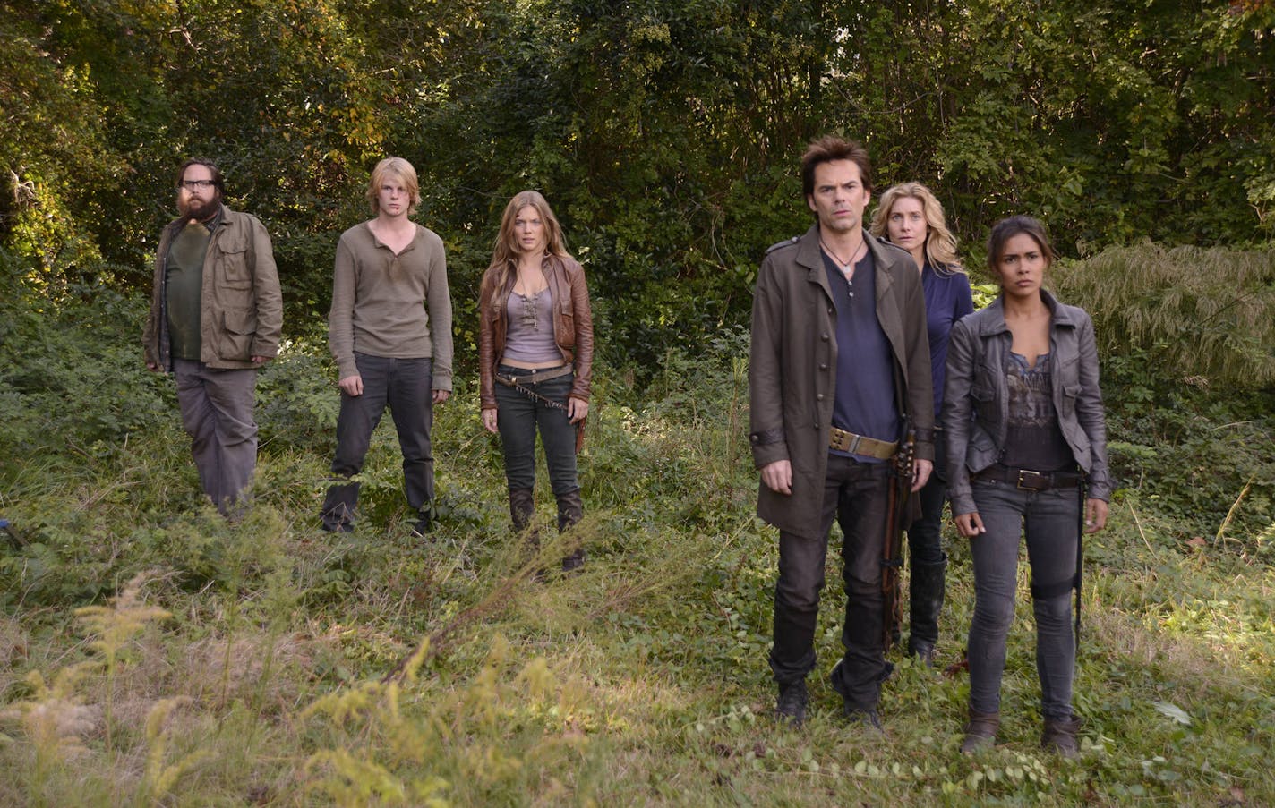 This publicity image released by NBC shows, from left, Zak Orth as Aaron, Graham Rogers as Danny Matheson, Tracy Spiridakos as Charlie Matheson, Billy Burke as Miles Matheson, Elizabeth Mitchell as Rachel Matheson, and Daniella Alonso as Nora from the series, "Revolution," returning March 25, 2013 on NBC. (AP Photo/NBC, Brownie Harris)