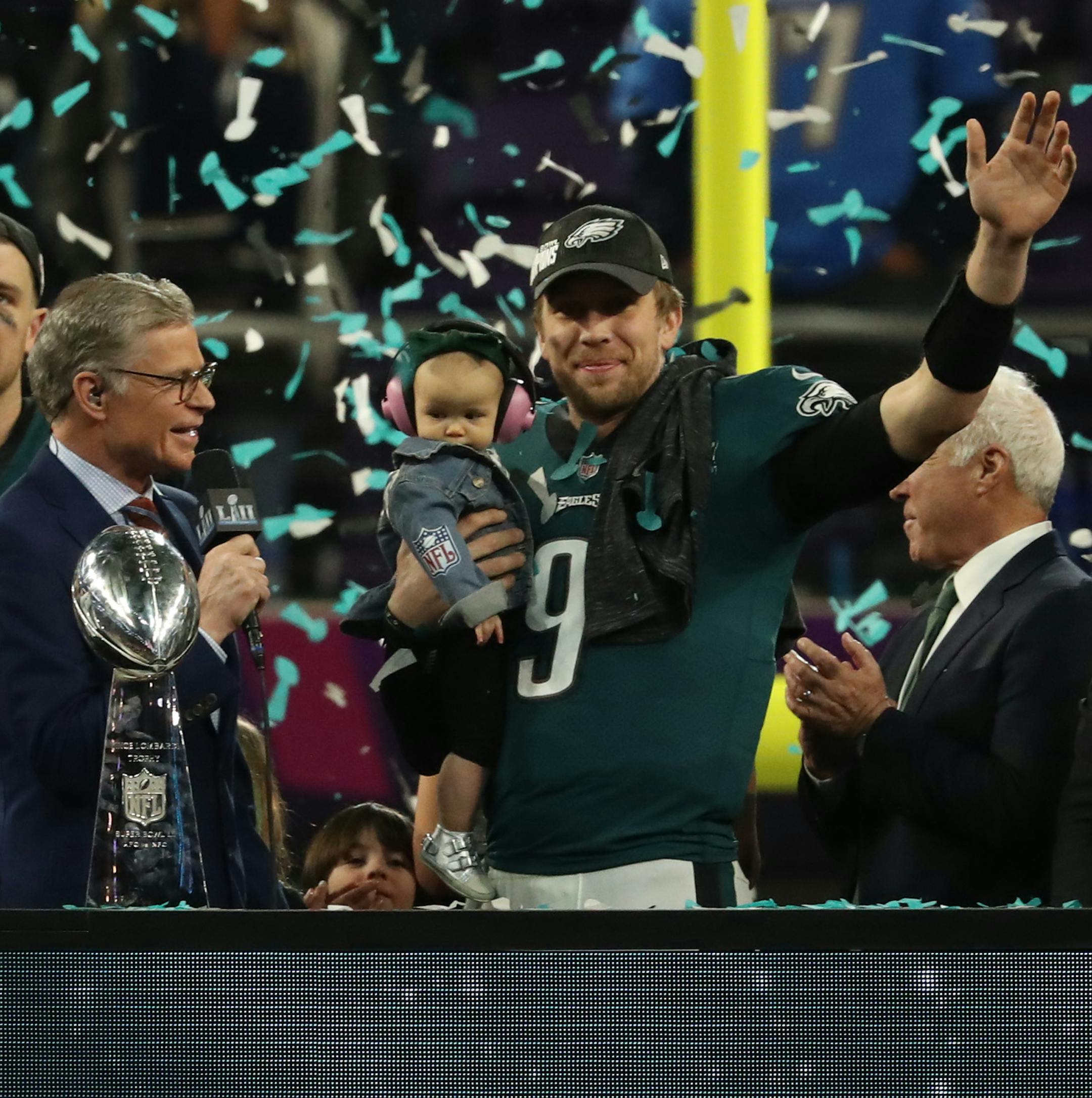 Philadelphia Eagles quarterback Nick Foles (9) held his son and waved during the victory celebration after Super Bowl LII.Foles was named the game's MVP. To the left is the Vince Lombardi Trophy. ] JEFF WHEELER ï jeff.wheeler@startribune.com The New England Patriots met the Philadelphia Eagles in Super Bowl LII Sunday evening, February 4, 2017 at U.S. Bank Stadium in Minneapolis.
