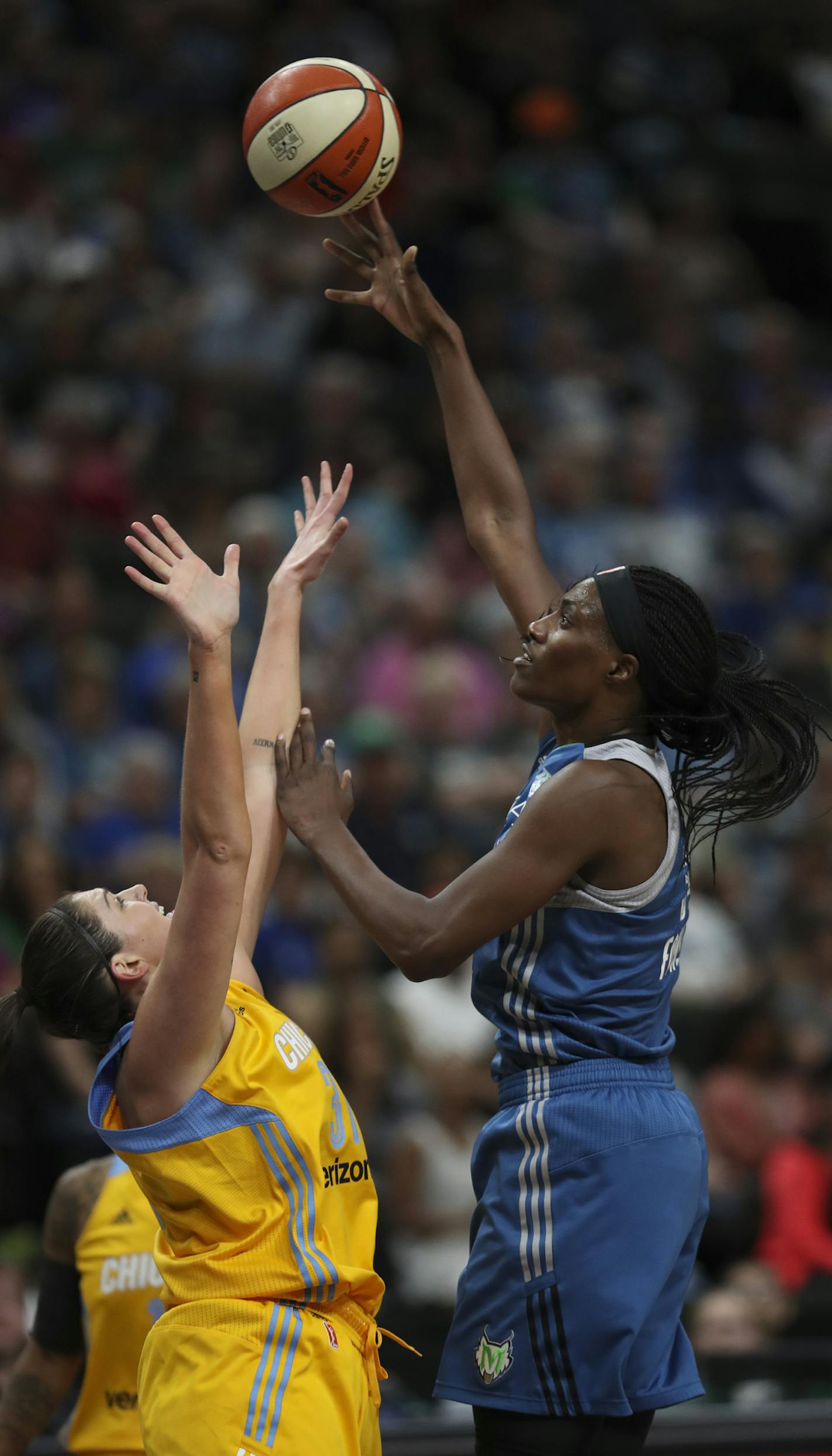 Minnesota Lynx center Sylvia Fowles (34), who lead all scorers with 26 points, shot over Chicago Sky center Stefanie Dolson (31) in the fourth quarter. ] JEFF WHEELER &#xef; jeff.wheeler@startribune.com The Minnesota Lynx opened their WNBA basketball season with a 70-61 win over the Chicago Sky Sunday evening, May 14, 2017 at Xcel Energy Center in St. Paul, their home for the entire 2017 season.