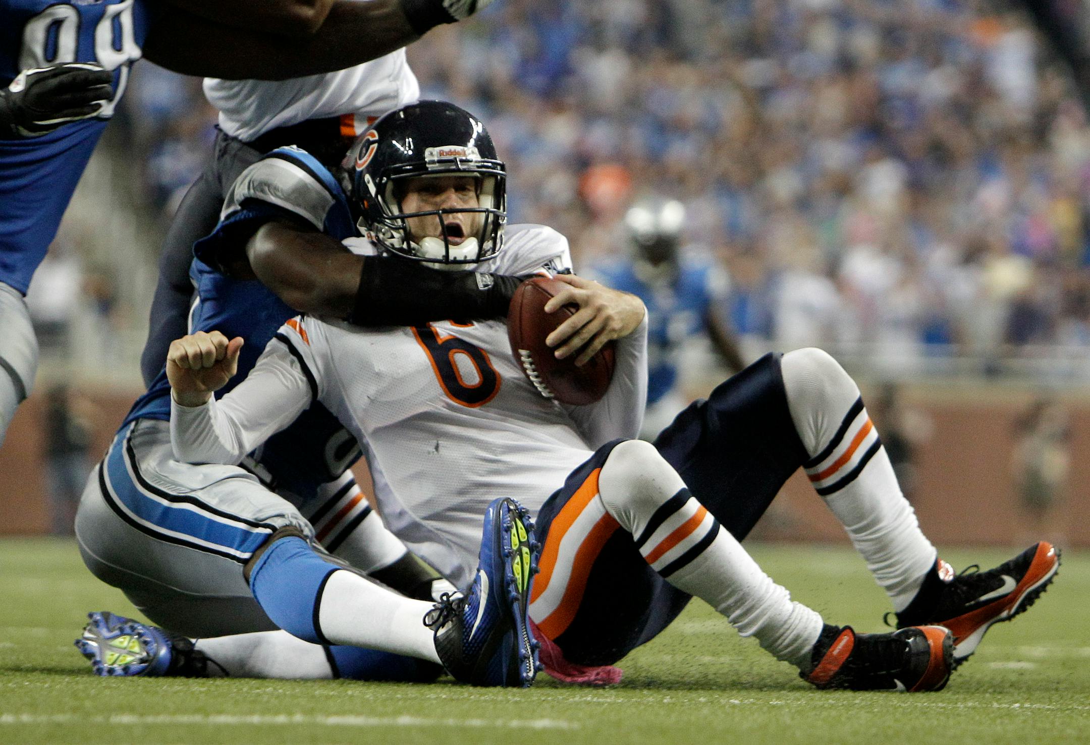 Detroit Lions defensive end Willie Young (79) sacks Chicago Bears quarterback Jay Cutler (6) in the fourth quarter of NFL football game in Detroit, Monday, Oct. 10, 2011. (AP Photo/Paul Sancya)