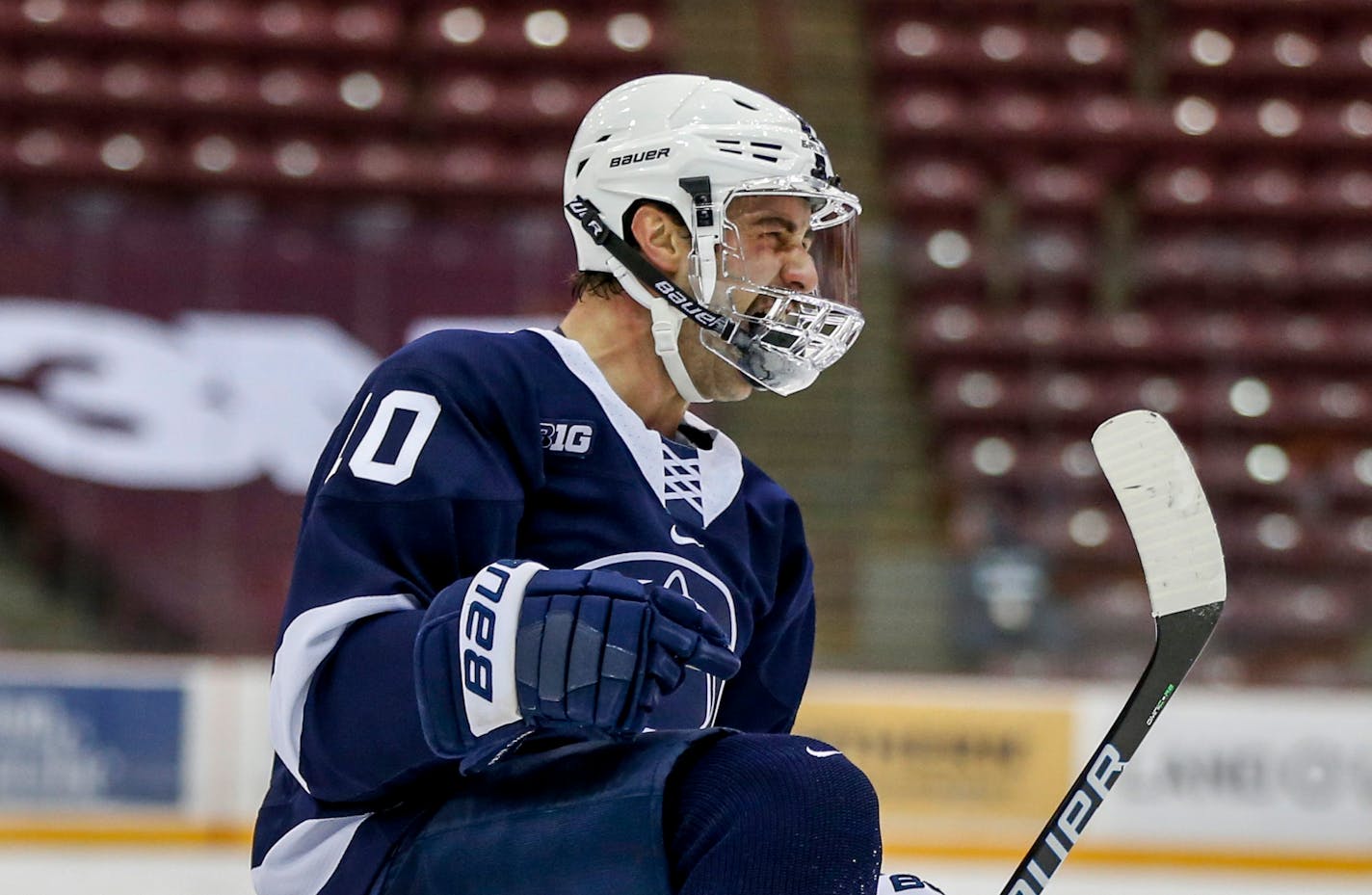 Penn State forward Christian Sarlo celebrates his goal against Minnesota in the first period of an NCAA hockey game on Friday, Nov. 20, 2020, in Minneapolis. (AP Photo/Bruce Kluckhohn)