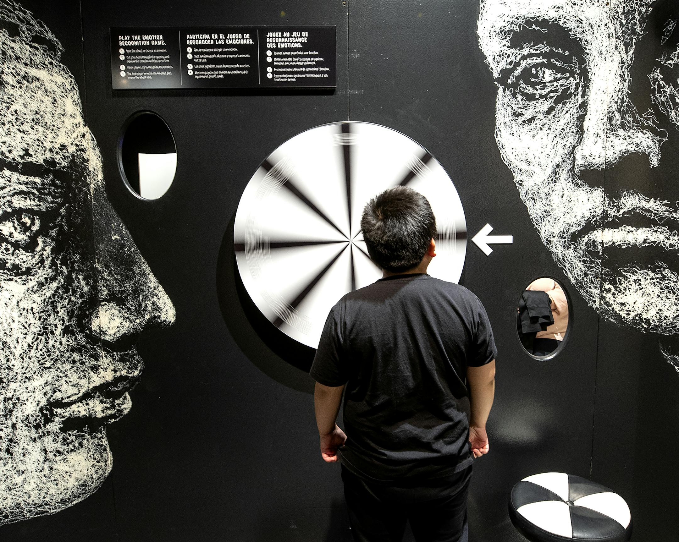 Noah Song, 10, spun the wheel of the "What am I Feeling" station at the Mind Matters exhibit at the Science Museum of Minnesota. ] CARLOS GONZALEZ &#x2022; cgonzalez@startribune.com &#x2013; May 2, 2018, St. Paul, MN, The Science Museum of Minnesota is the first stop for a ground-breaking, multi-media, interactive exhibit around mental illness. Mind Matters exhibit at the Science Museum of Minnesota