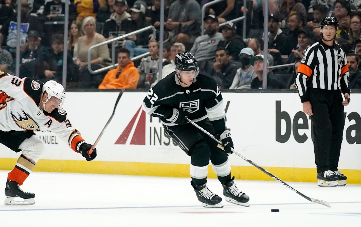 Los Angeles Kings left wing Kevin Fiala, right, takes the puck as Anaheim Ducks right wing Jakob Silfverberg reaches for him during the second period of a preseason NHL hockey game Saturday, Oct. 8, 2022, in Los Angeles. (AP Photo/Mark J. Terrill)