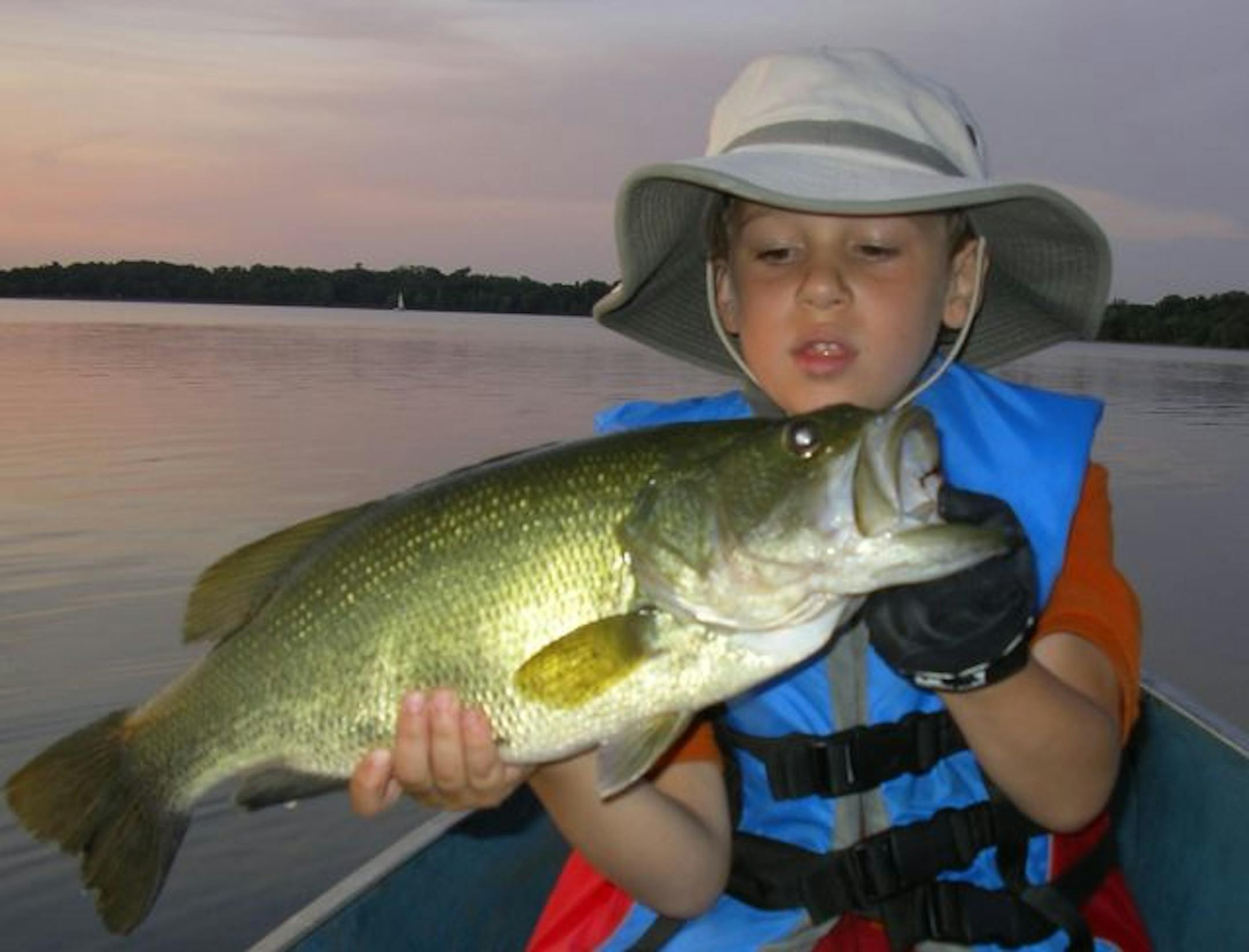 Dane Hanks, 5, of Richfield, landed this 5-pound, 21-inch largemouth bass on Lake Harriet in Minneapolis -- proving you don't have to go far in Minnesota to catch trophy fish.
