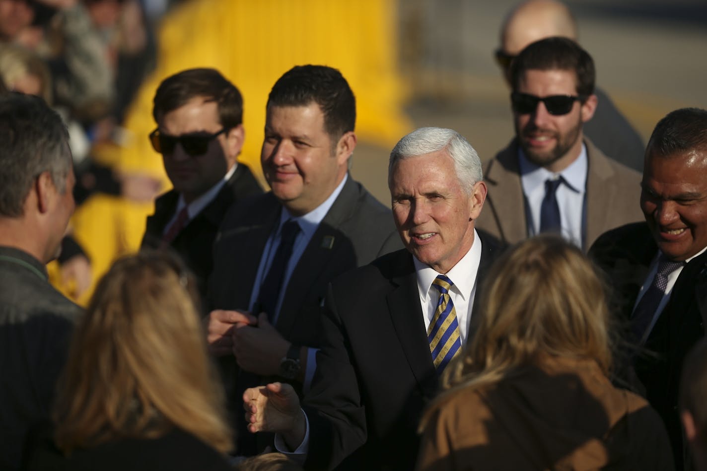 Supporters shook hands with Vice President Mike Pence after his arrival Tuesday at the Minnesota National Guard's 934th Airlift Wing.